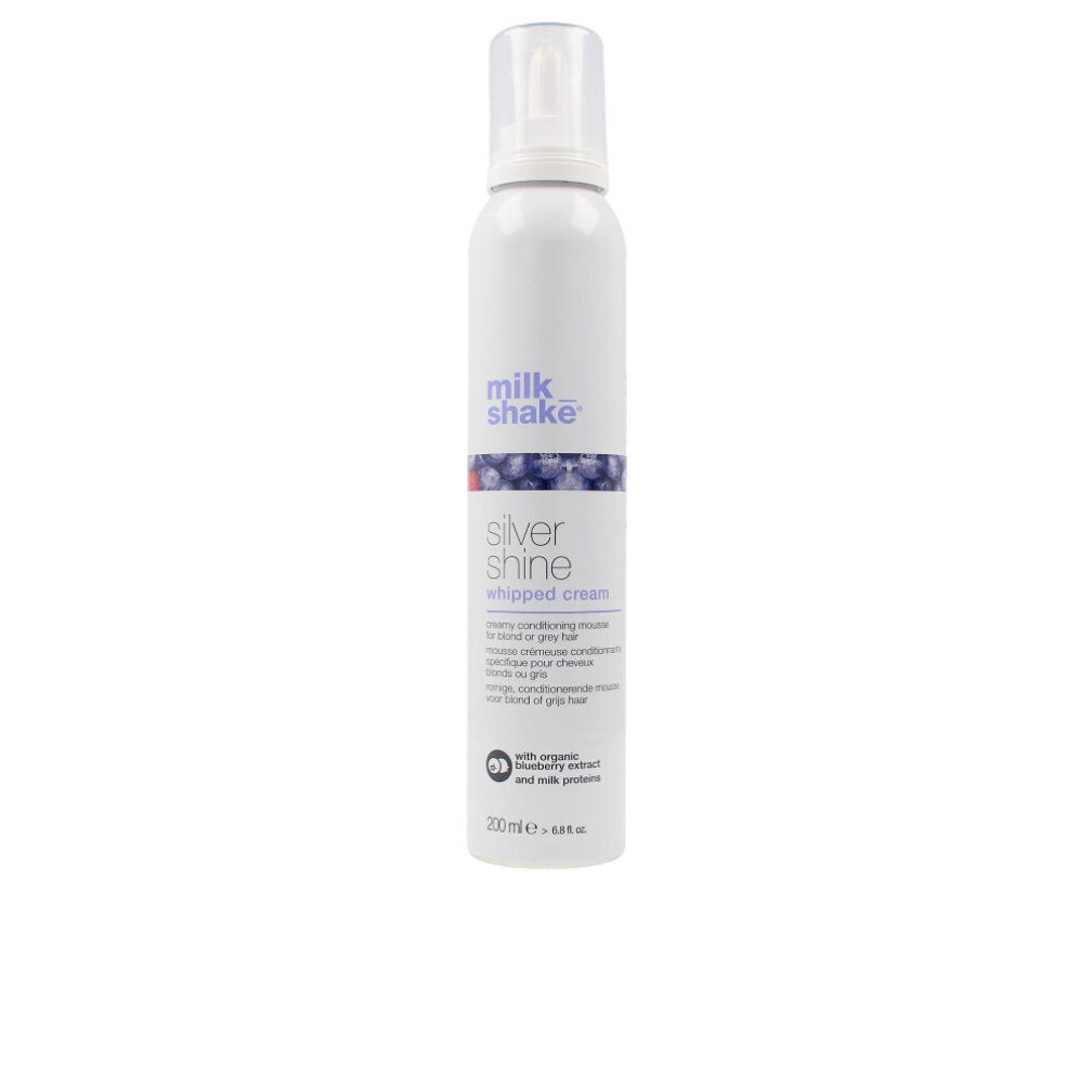 Flacone spray bianco con "milk shake silver shine whipped cream". Accenti blu e rossi. Contenuto 200 ml.