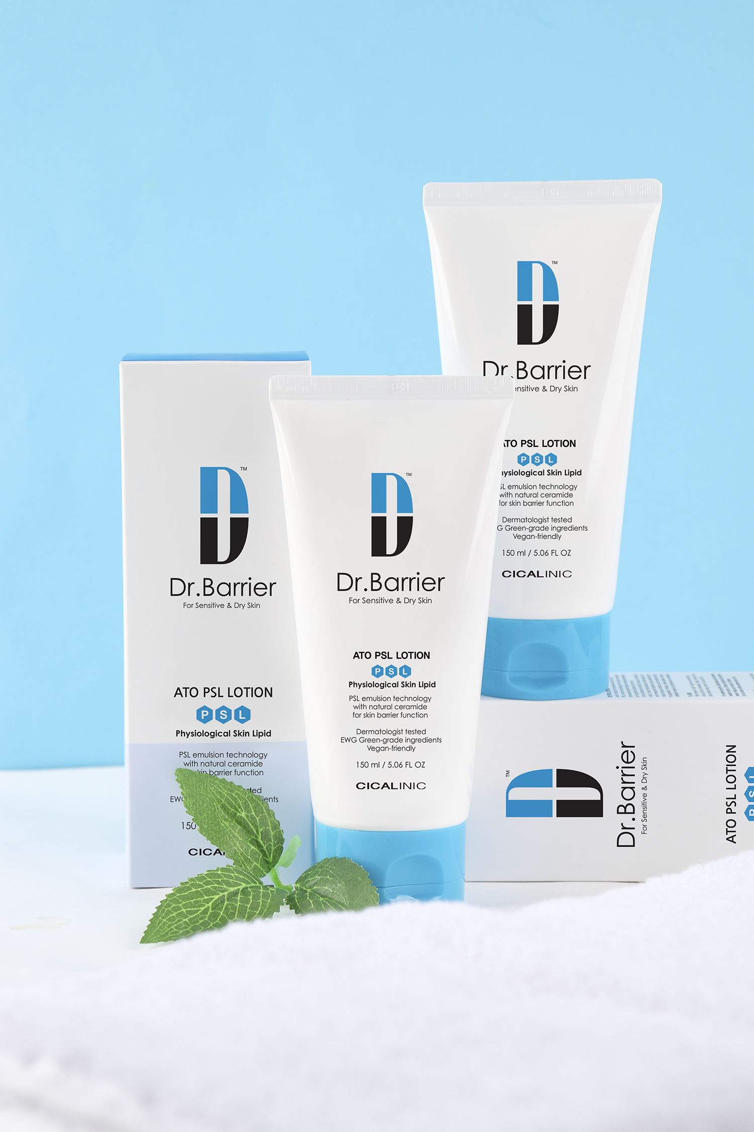 Più tubi e scatole con dettagli blu. Scritta: Dr.Barrier ATO PSL Lotion. Per pelli sensibili e secche.
