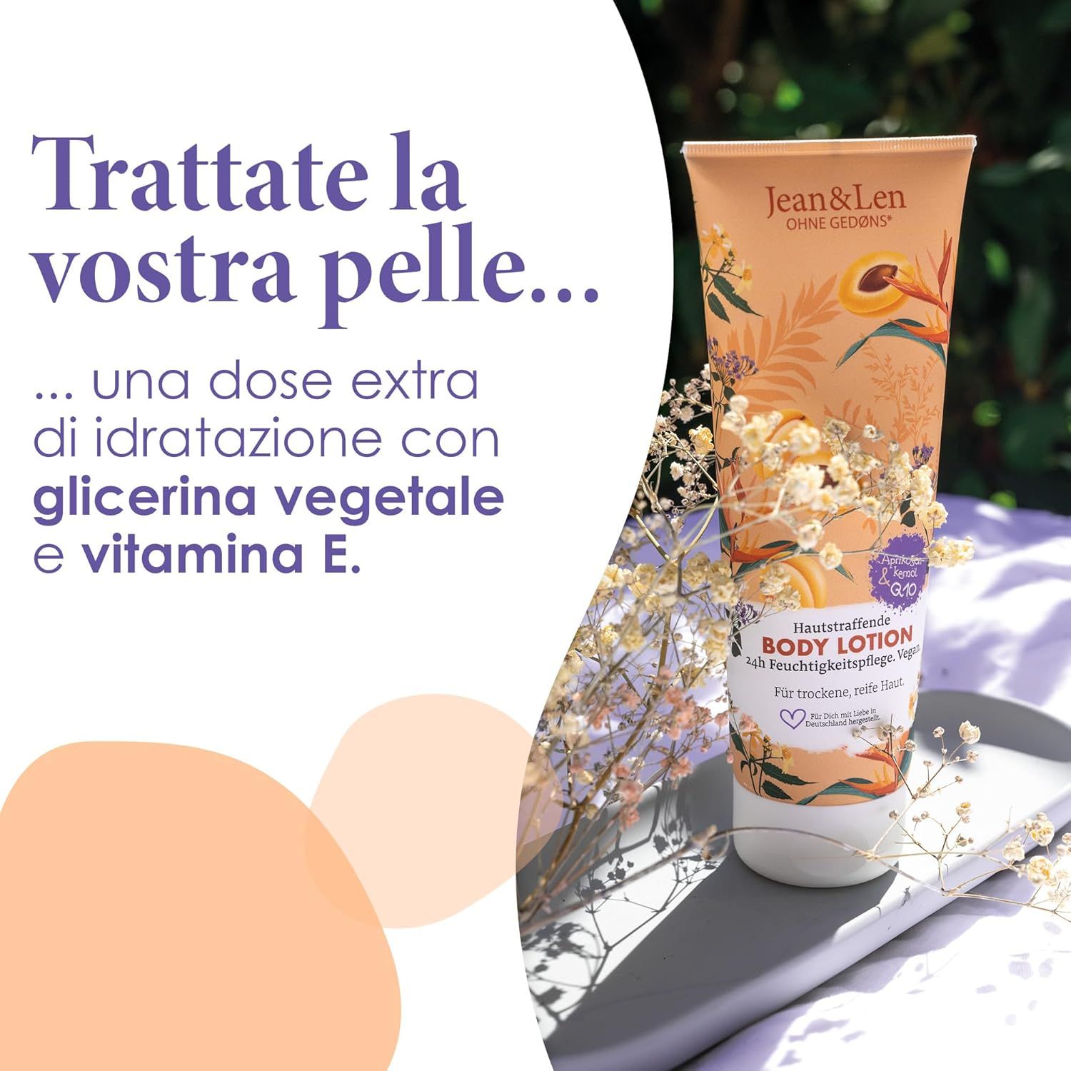 Tubo di lozione per il corpo Jean & Len con olio di nocciolo di albicocca e Q10. Albicocche e pesca accanto.