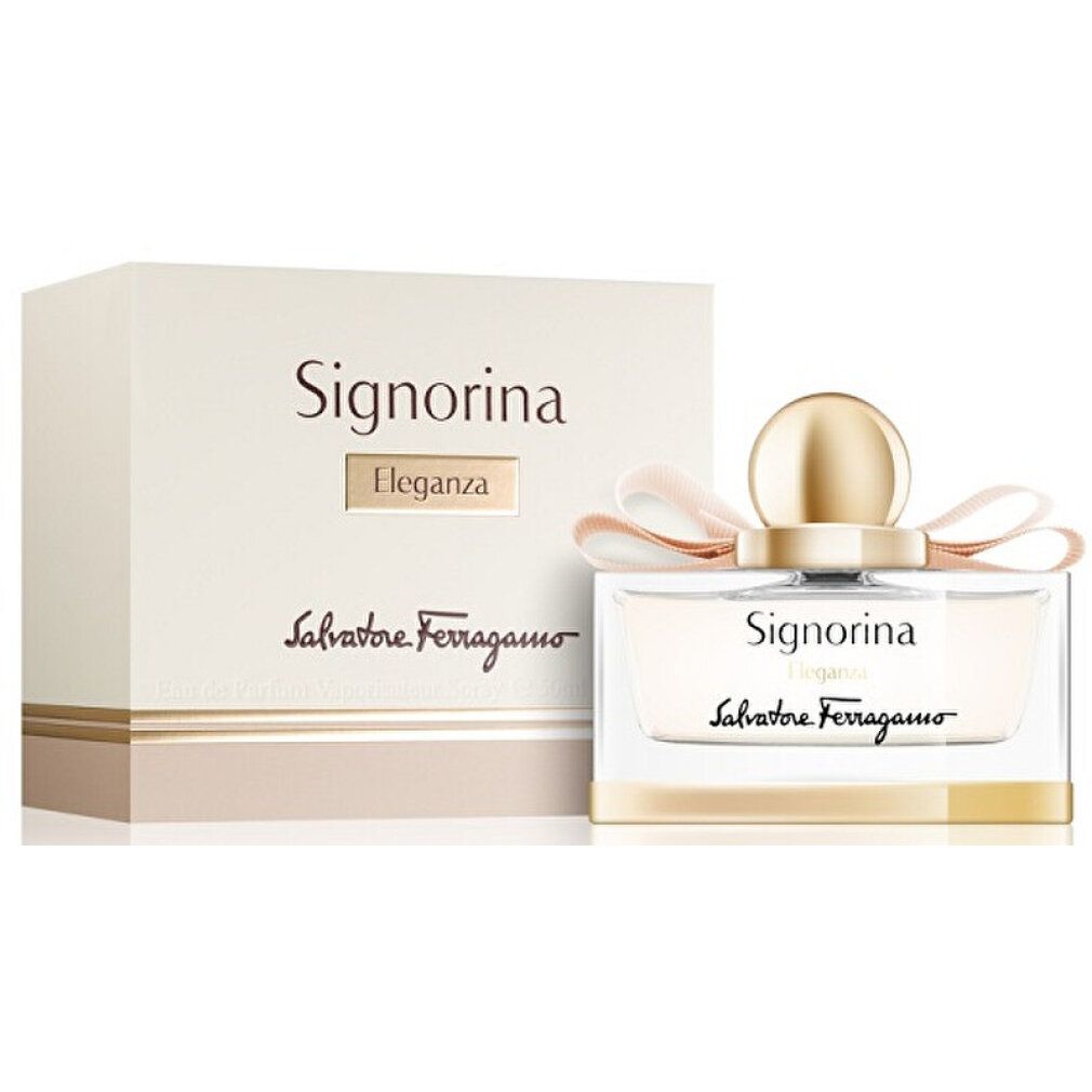Flacone di profumo e confezione. Flacone rettangolare con tappo e fiocco dorati. Confezione con scritta Signorina Eleganza.