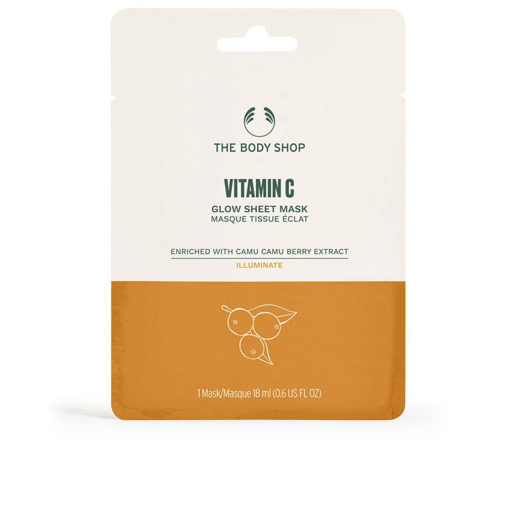 Confezione maschera in tessuto. Parte superiore bianca, inferiore arancione. Testo: The Body Shop, Vitamin C, Glow Sheet Mask, Camu Camu Berry Extract, Illuminate.