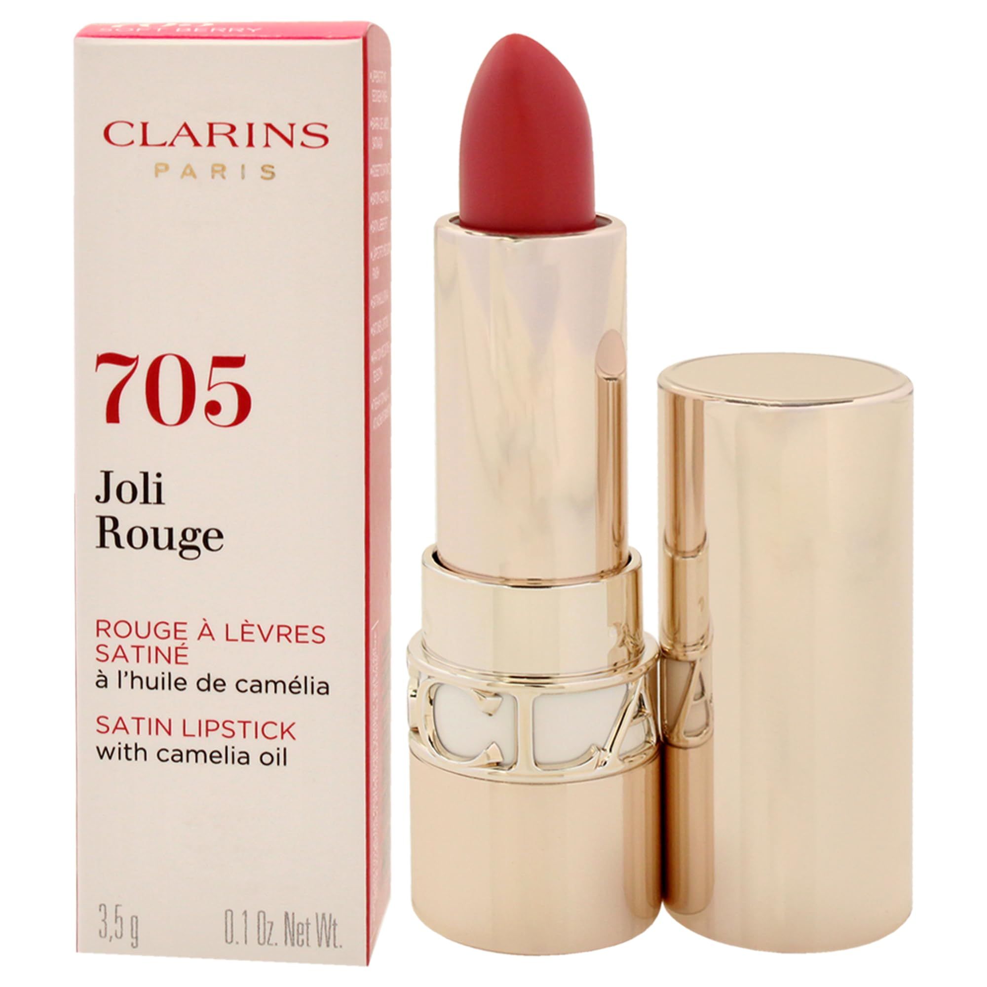 Rossetto rosso in astuccio dorato, aperto. Confezione con nome e dettagli del prodotto.