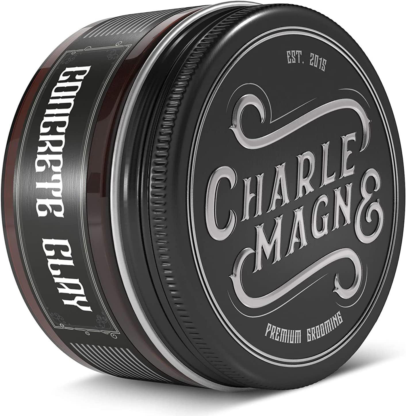 Vasetto scuro con coperchio nero, etichettato "ORIGINAL POMADE".