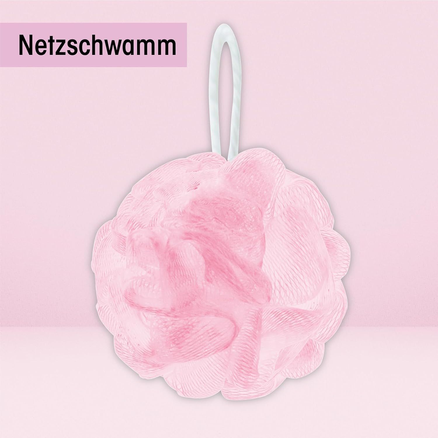 Spugna da bagno rosa con nastro bianco per appendere.