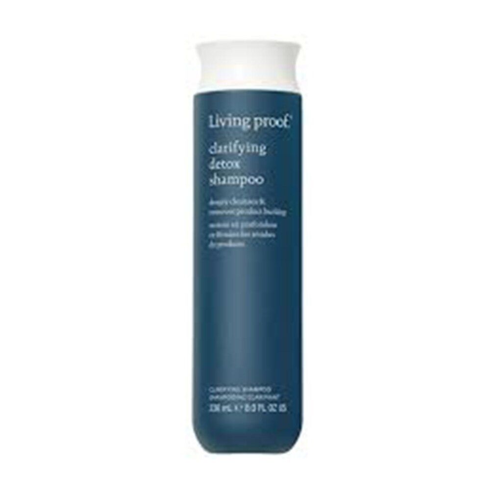 Flacone di shampoo blu turchese con tappo bianco. Scritta: Living Proof, clarifying detox shampoo. 236 ml.