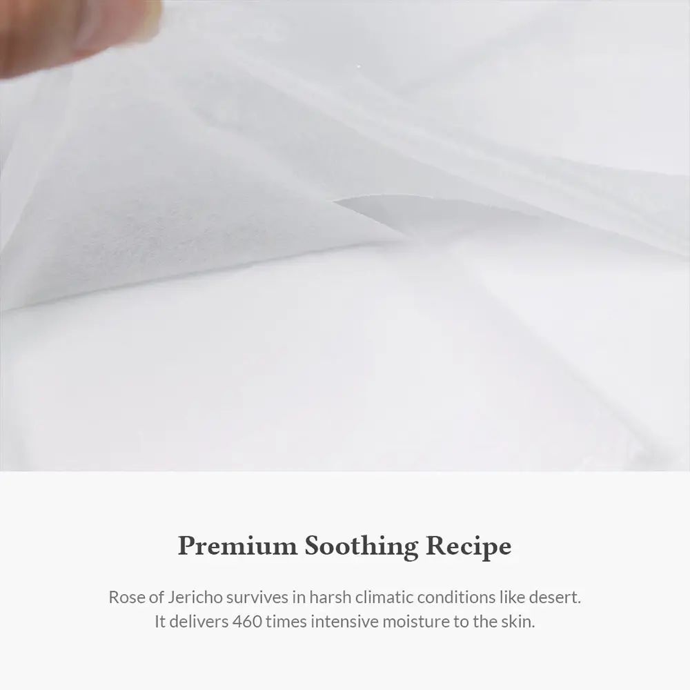 Primo piano di una maschera per il viso bianca. Testo: Premium Soothing Recipe. La rosa di Gerico fornisce un'idratazione intensa.