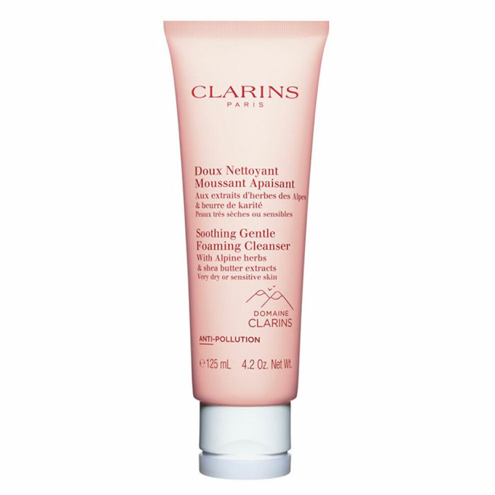 Tubo rosa con tappo bianco. Testo: Clarins Paris, Doux Nettoyant Moussant Apaisant, Soothing Gentle Foaming Cleanser. Anti-Pollution.