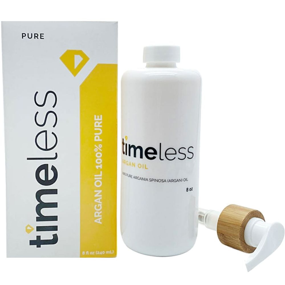 Confezione del prodotto e flacone con pompa. Scritta: timeless, Argan Oil. Striscia gialla con logo diamante. 8 oz.