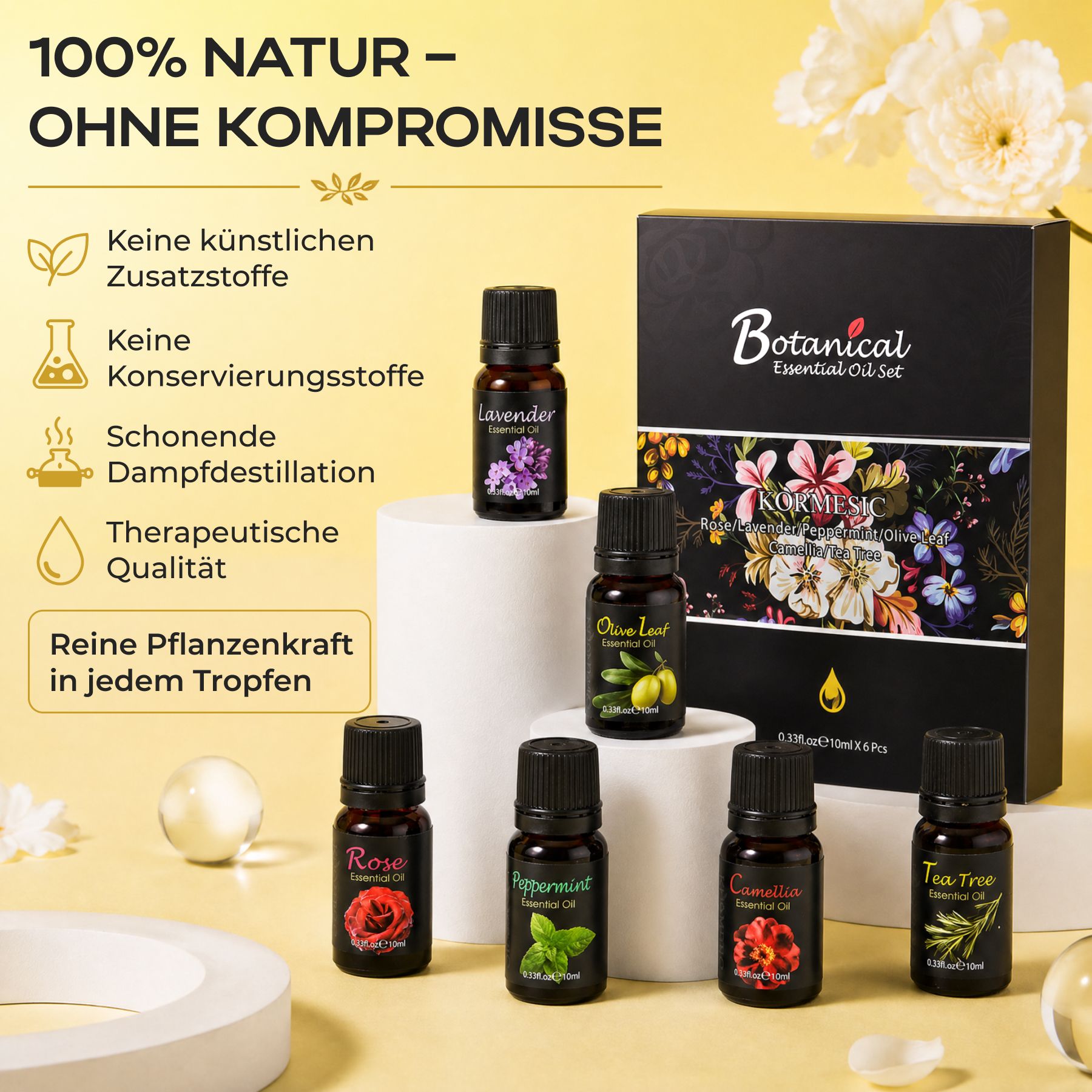 Set di sei piccole bottiglie di oli essenziali, tra cui lavanda, foglia d'ulivo, rosa, menta piperita, cannella e tea tree. Include una scatola regalo nera.