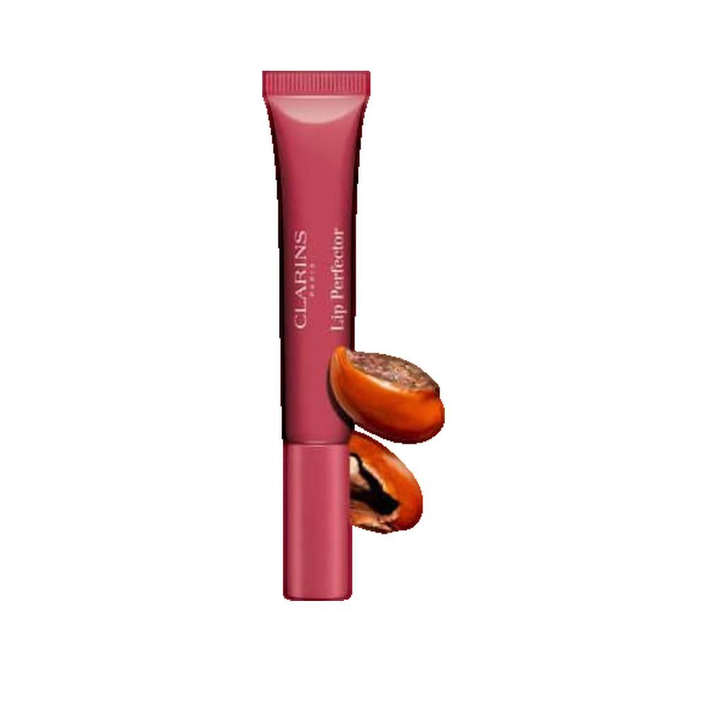 Lip Perfector in tubo. Tonalità: Pomegranate Intense Maple 17. Marchio: Clarins. Testo sul tubo: Lip Perfector. Accanto: due metà di melograno.