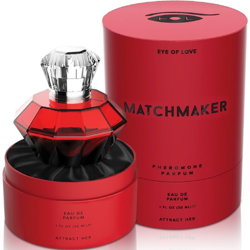 Flacone di profumo a forma di diamante rosso e confezione cilindrica. Scritte: MATCHMAKER, Profumo ai feromoni, Eau de Parfum, Attract Her.