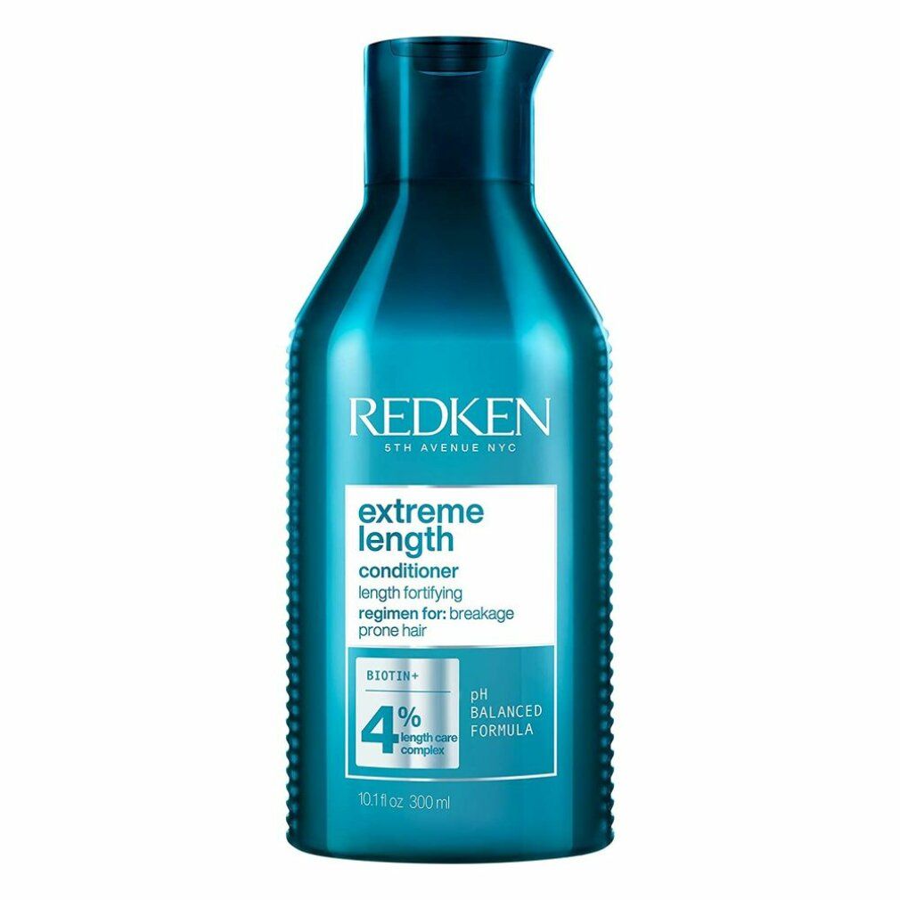 Flacone turchese con tappo blu. Scritta: Redken Extreme Length Conditioner. Contiene Biotina+ e 4% Length Care Complex.