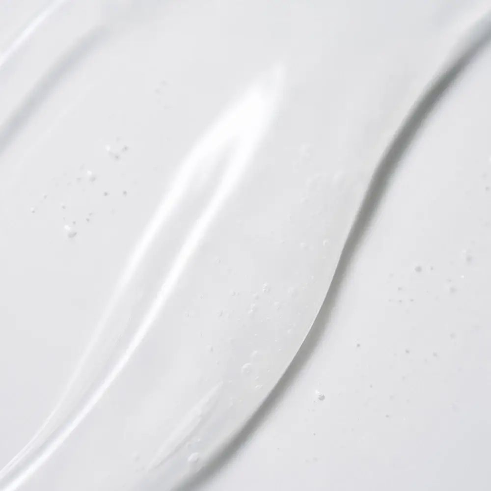 Primo piano di gel trasparente. Texture liquida con piccole bolle.