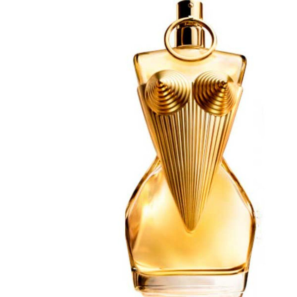 Flacone di profumo dorato a forma di busto. Flacone con dettagli che evidenziano il seno e la parte superiore del corpo. Su sfondo bianco.
