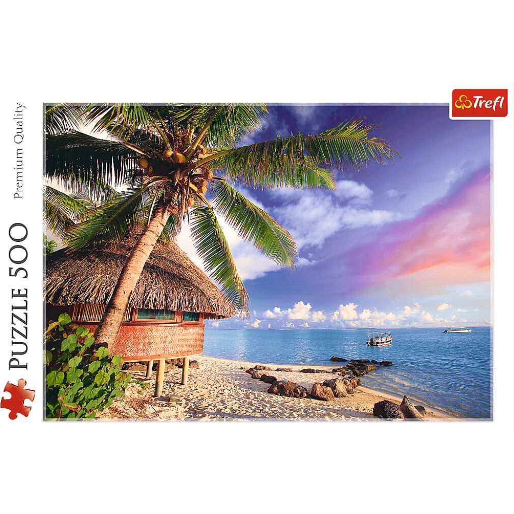 Scatola puzzle con motivo spiaggia. Scritta "Puzzle 500". Logo Trefl. Premium Quality. Parti del puzzle visibili.