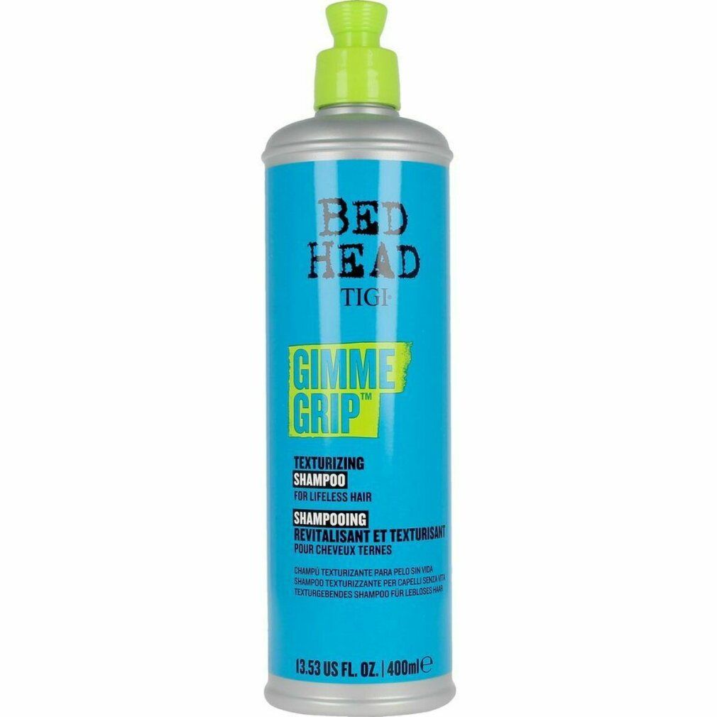 Flacone di shampoo blu turchese con erogatore verde. Scritta: Bed Head TIGI Gimme Grip Texturizing Shampoo.