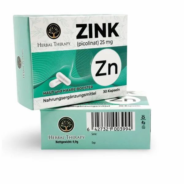 Scatola di Zink (picolinato) 25 mg. Scritta: Herbal Therapy, Zink, 30 capsule. Scatola inferiore con codice a barre e informazioni. Peso netto: 9,9g.
