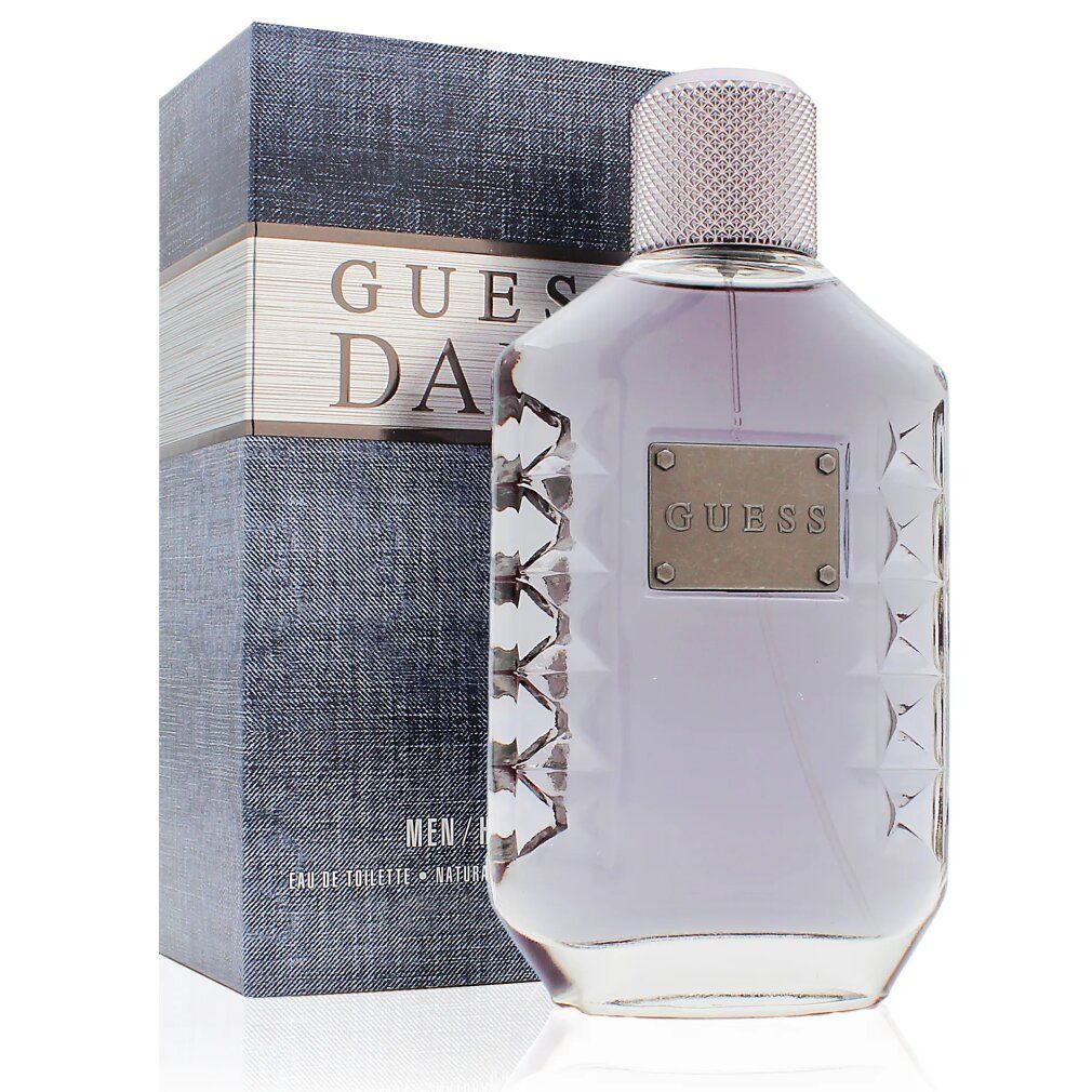 Una bottiglia di vetro con tappo argentato e una scatola, contenente "Guess Dare" Eau de Toilette.