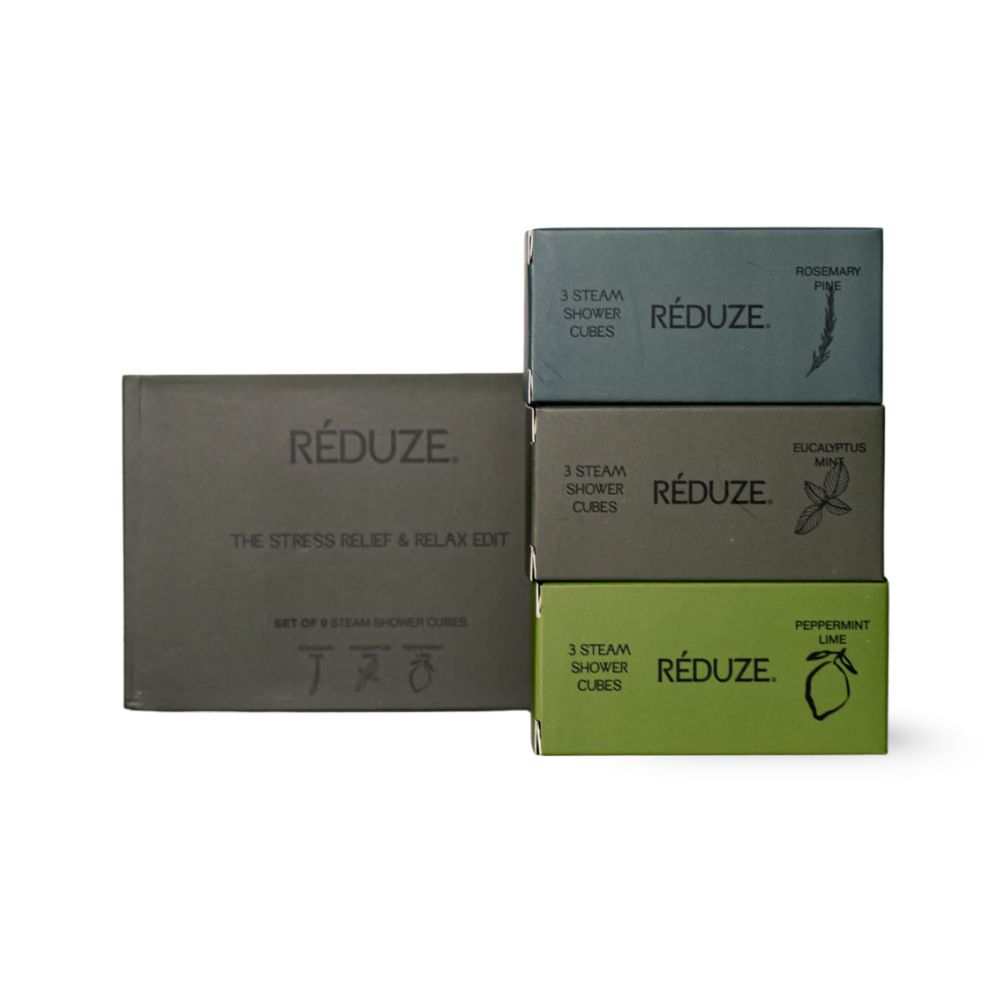 Scatola verde scuro con logo "RÉDUZE". Testo: "THE STRESS RELIEF & RELAX EDIT". Accanto, 3 scatole con 3 cubi doccia.