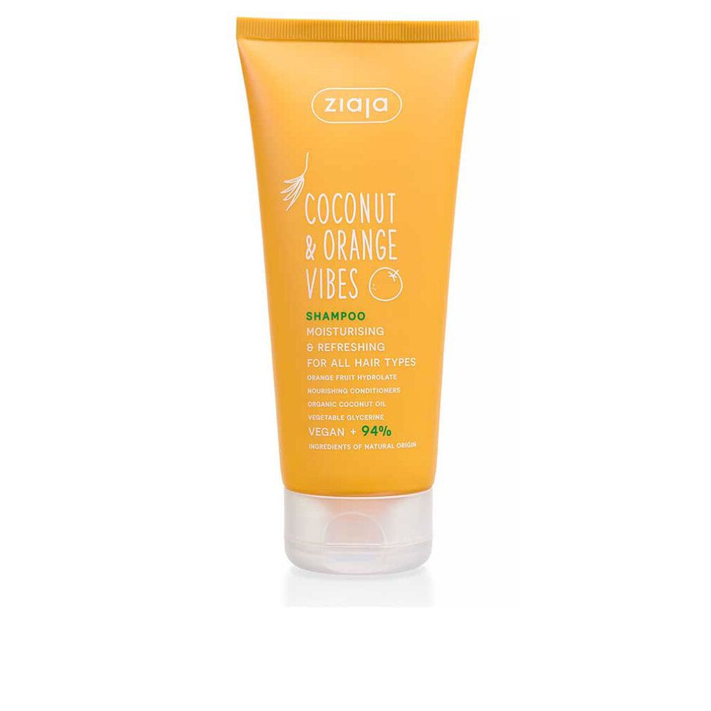 Tubo giallo con testo. Shampoo Coconut & Orange Vibes, idratante e rinfrescante. Marchio Ziaja. Vegano.