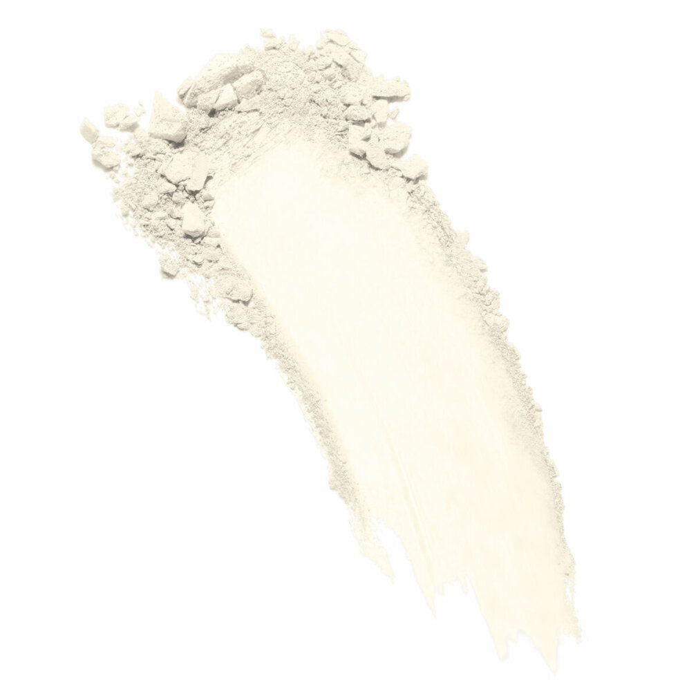 Traccia obliqua di polvere chiara su sfondo bianco. La texture è visibile.
