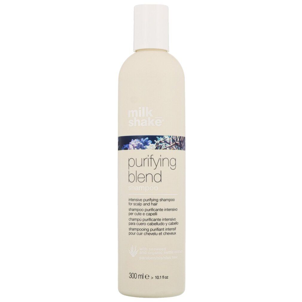 Flacone di shampoo beige con tappo bianco. Scritta: purifying blend. Nome del prodotto e testo in più lingue. 300 ml.