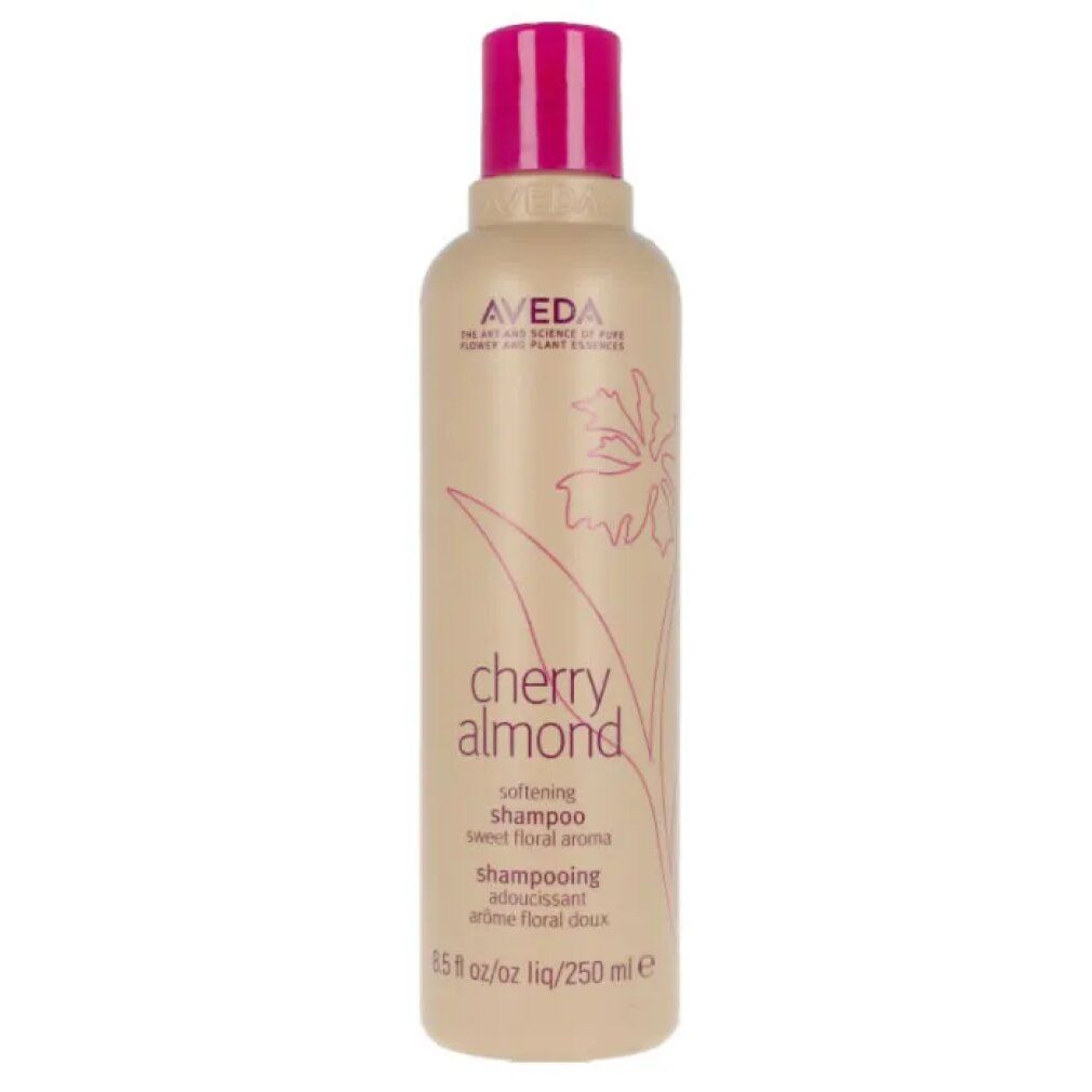Flacone di shampoo beige con tappo rosa. Scritta: Cherry Almond, Aveda. 250 ml.