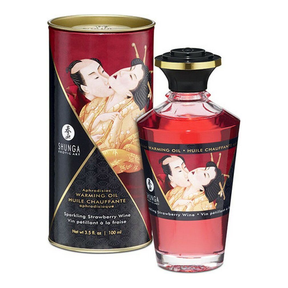 Flacone e scatola rossi con etichette. Scritta: Shunga, Olio riscaldante, aroma fragola. Illustrazione di una coppia che si bacia.