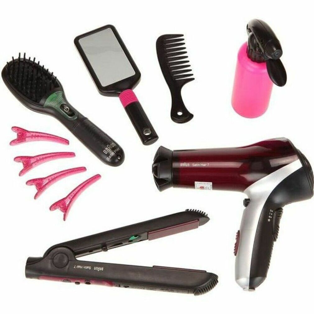 Set per capelli con asciugacapelli, piastra, spazzola, specchio, pettine, forcine e spruzzatore. Elementi neri e rosa.