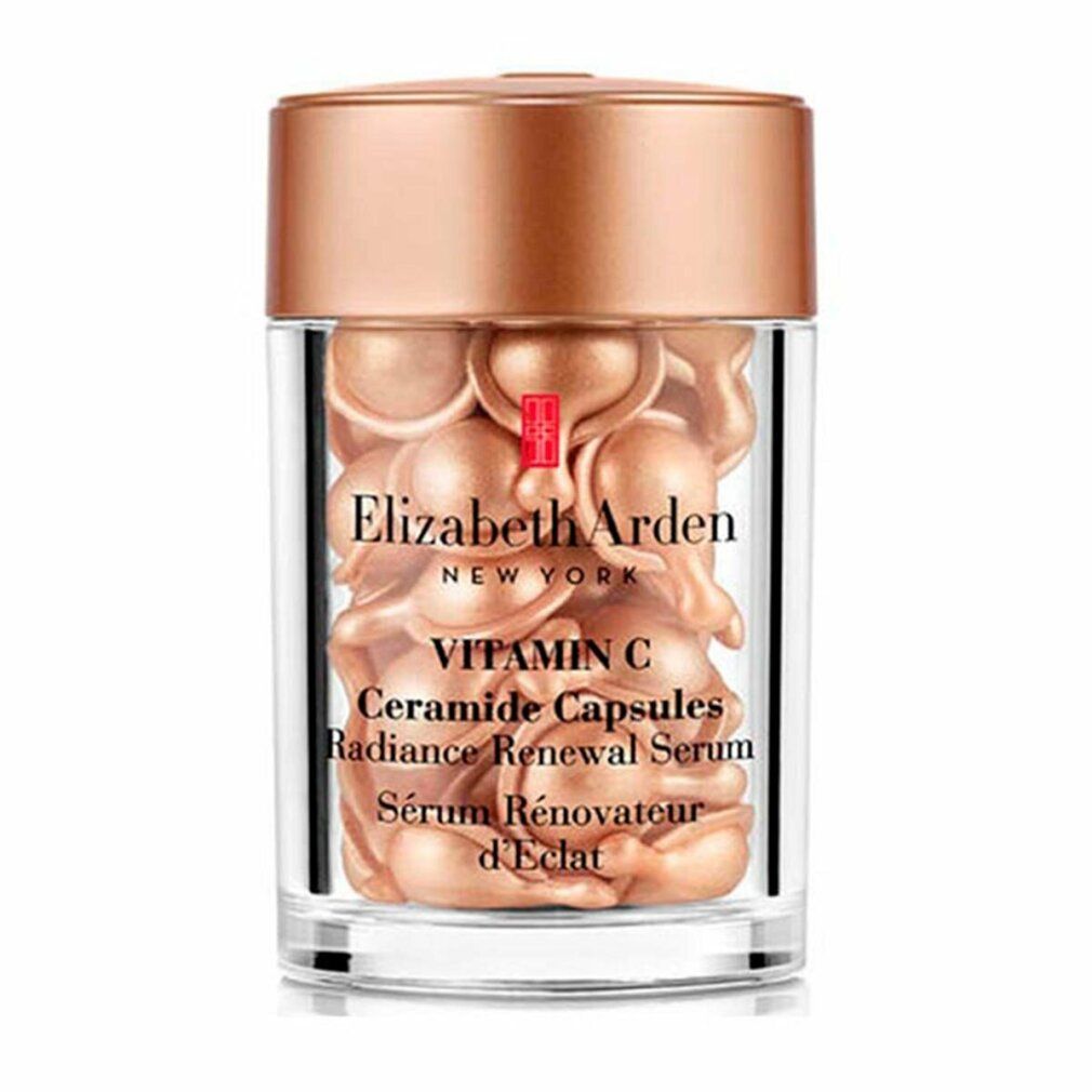 Flacone in vetro con capsule dorate. Scritta: Elizabeth Arden Vitamin C Ceramide Capsules. Siero Rénovateur d'Éclat.