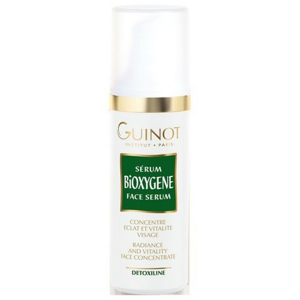 Flacone bianco con etichetta verde. Scritta: Guinot, Sérum Bioxygene Face Serum. Con anello dorato ed erogatore a spruzzo.
