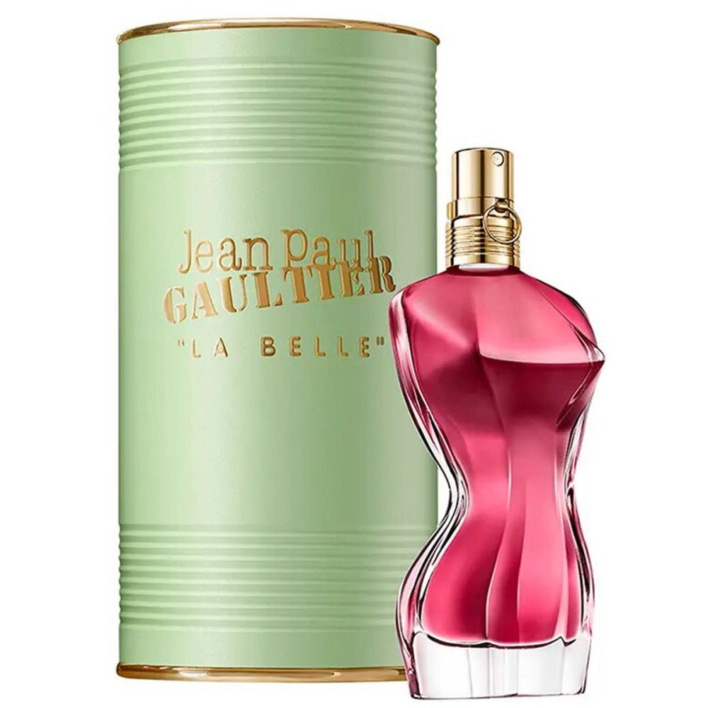 Flacone di profumo a forma di corpo femminile e scatola verde. Testo: Jean Paul Gaultier, La Belle.