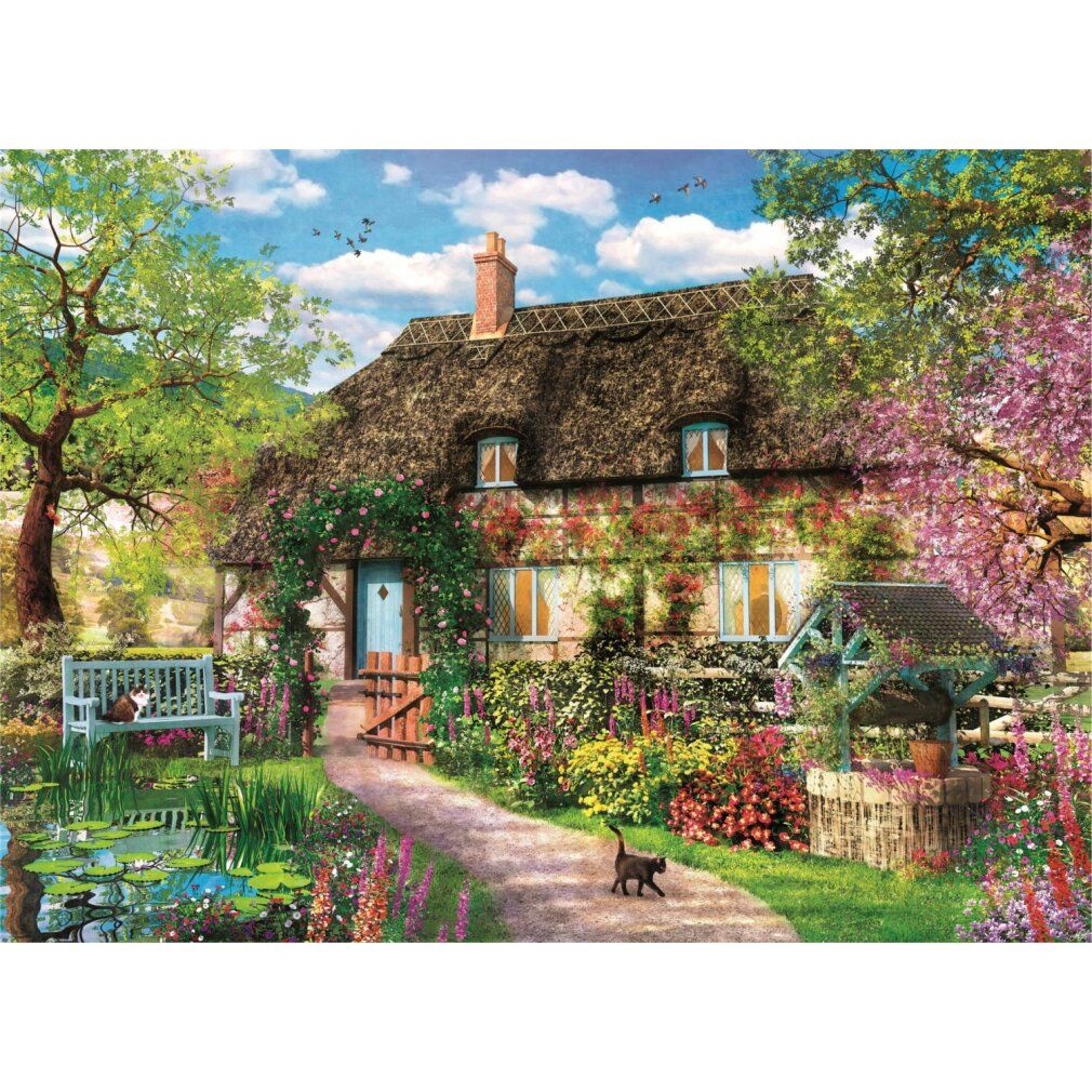 Puzzle Clementoni 1000 pezzi. Immagine del cottage con giardino sulla confezione. Scritta: High Quality Collection.