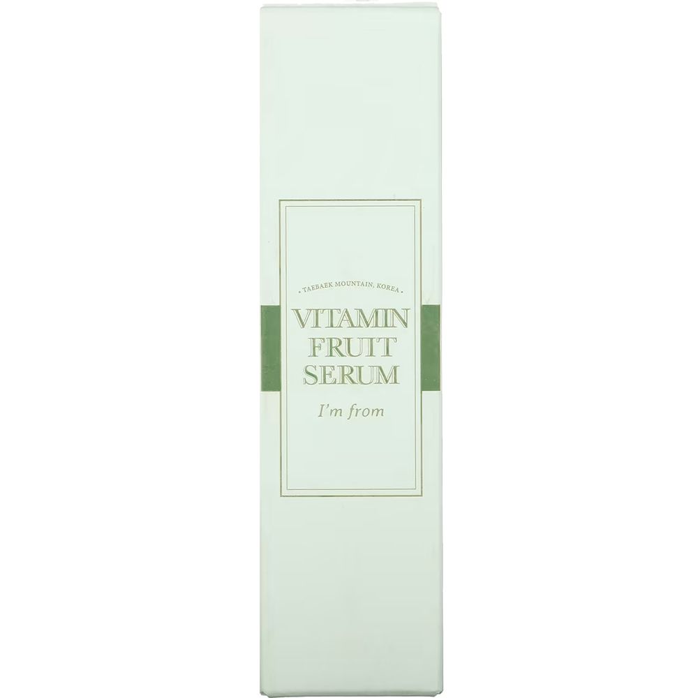 Confezione rettangolare alta. Scritta: Vitamin Fruit Serum, I'm from. Colori verde e bianco.