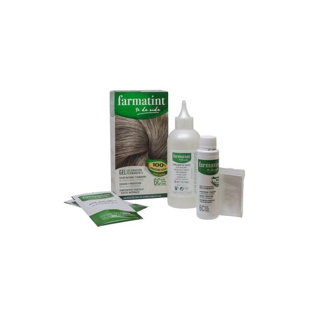 Kit tinta per capelli Farmatint con scatola, flacone applicatore, flacone sviluppatore e bustina.