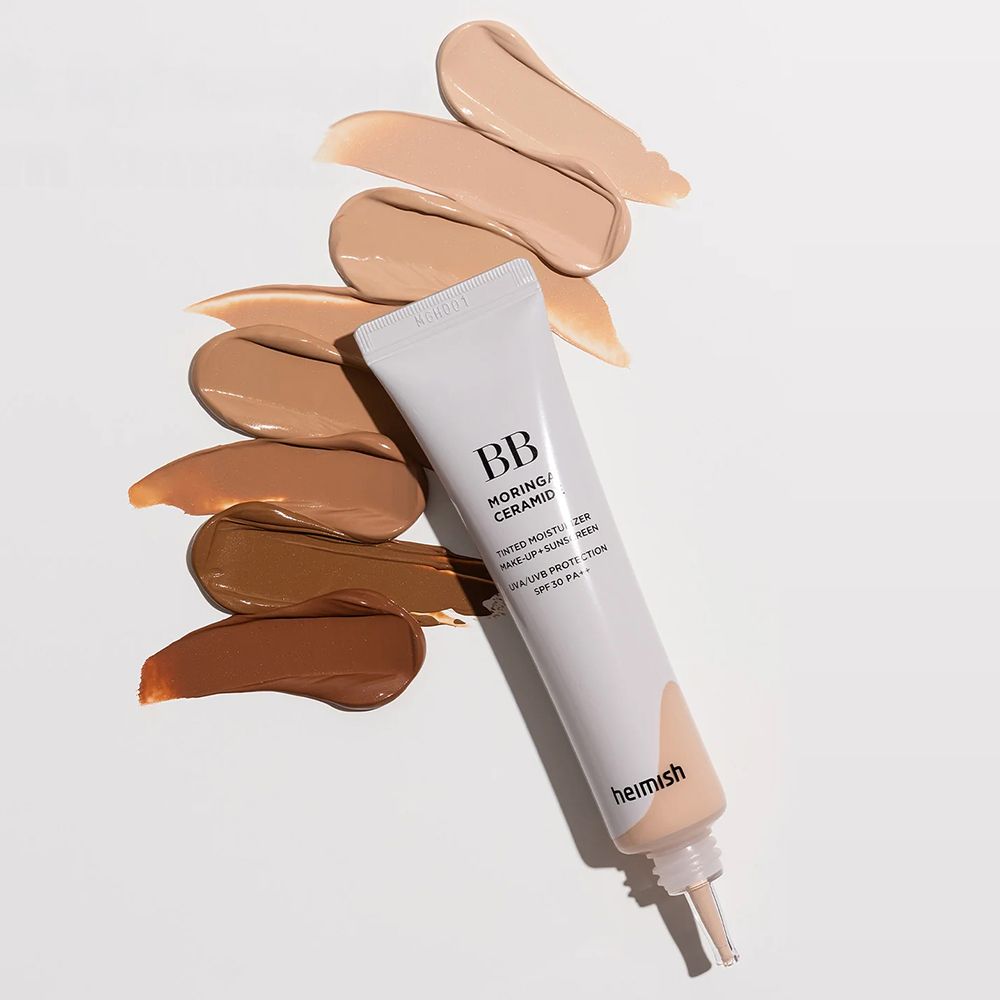 Tubetto di BB Moringa Ceramide BB Cream con campioni di colore e texture.