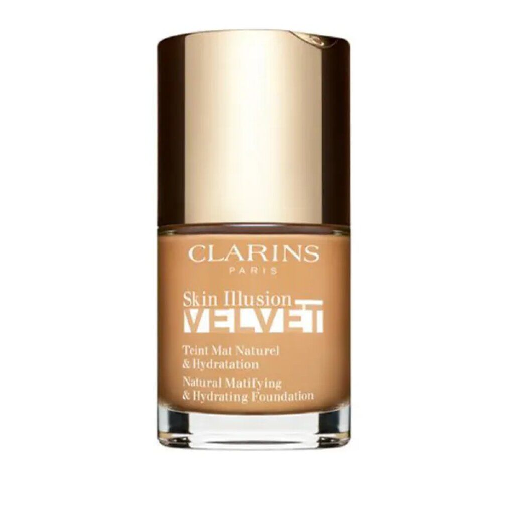 Fondotinta liquido in flacone di vetro con tappo dorato. Scritte: CLARINS, Skin Illusion Velvet, Teint Mat Naturel & Hydratation.