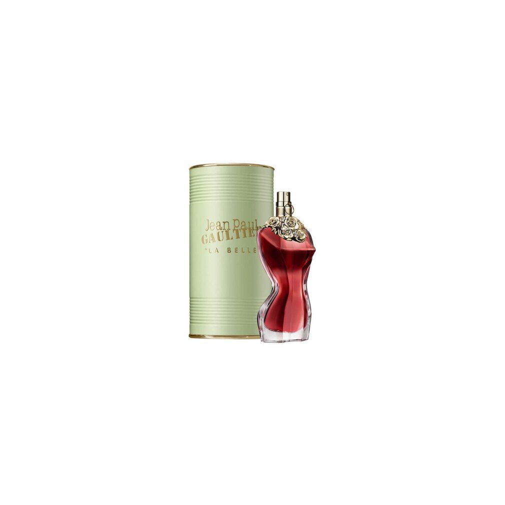 Flacone rosso a forma di corpo femminile accanto a scatola verde. Scritta dorata: Jean Paul Gaultier, La Belle.