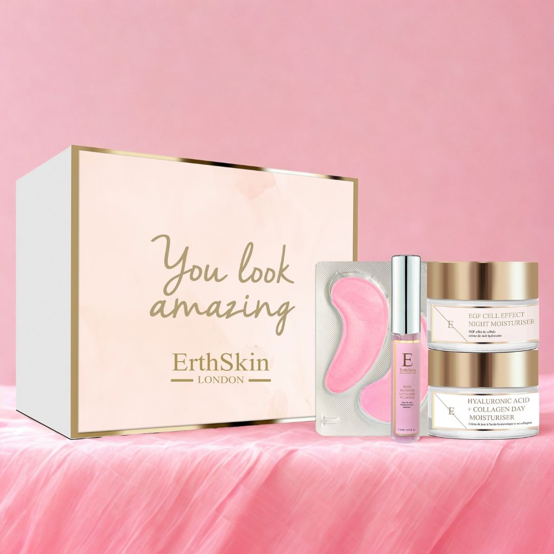 Confezione regalo ErthSkin London con patch occhi, siero e creme. Scritta "You look amazing". Accenti rosa e oro.