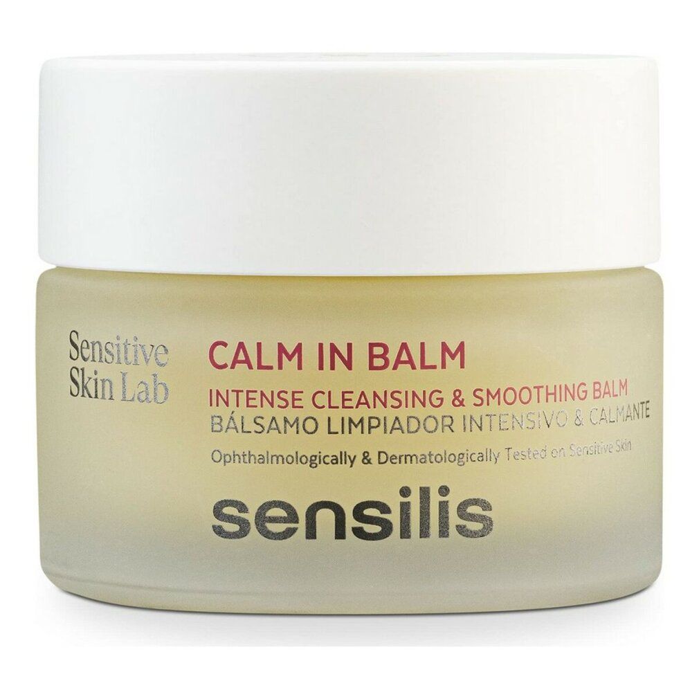 Vasetto di crema con coperchio bianco. Scritta: CALM IN BALM, sensilis. Per pelli sensibili. Balsamo detergente e levigante intenso.