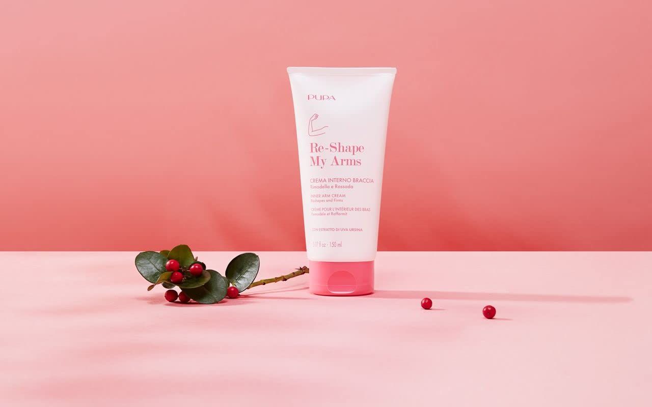 Tubo bianco con tappo rosa su sfondo rosa. Testo: PUPA, Re-Shape My Arms.