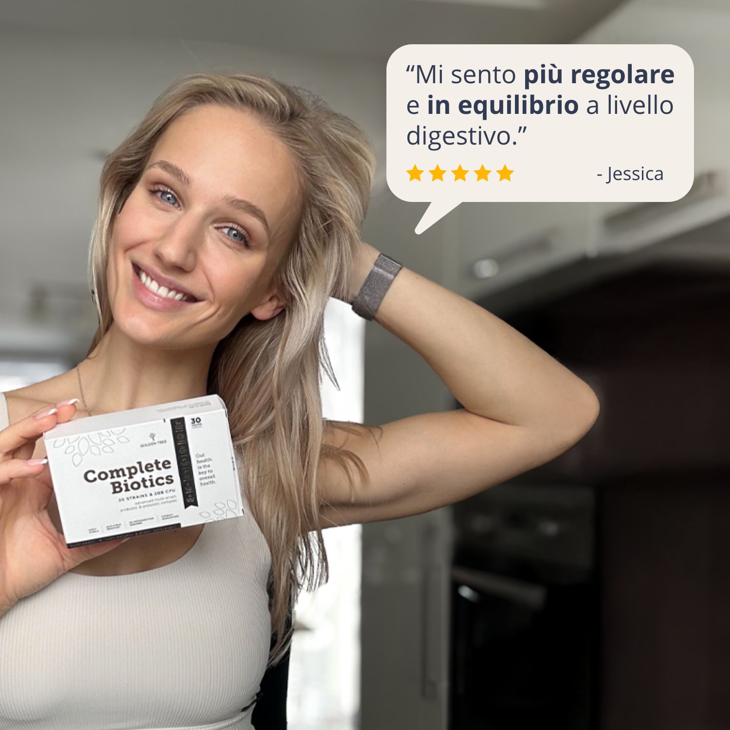 Donna con Golden Tree Complete Biotics. Citazione: 'Il mio transito si sente più equilibrato e costante.'