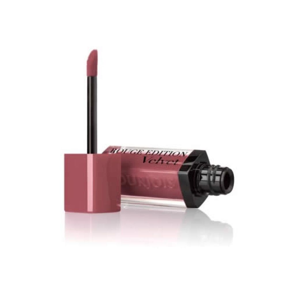 Rossetto liquido opaco, flacone coricato, applicatore accanto, finitura opaca rosata.