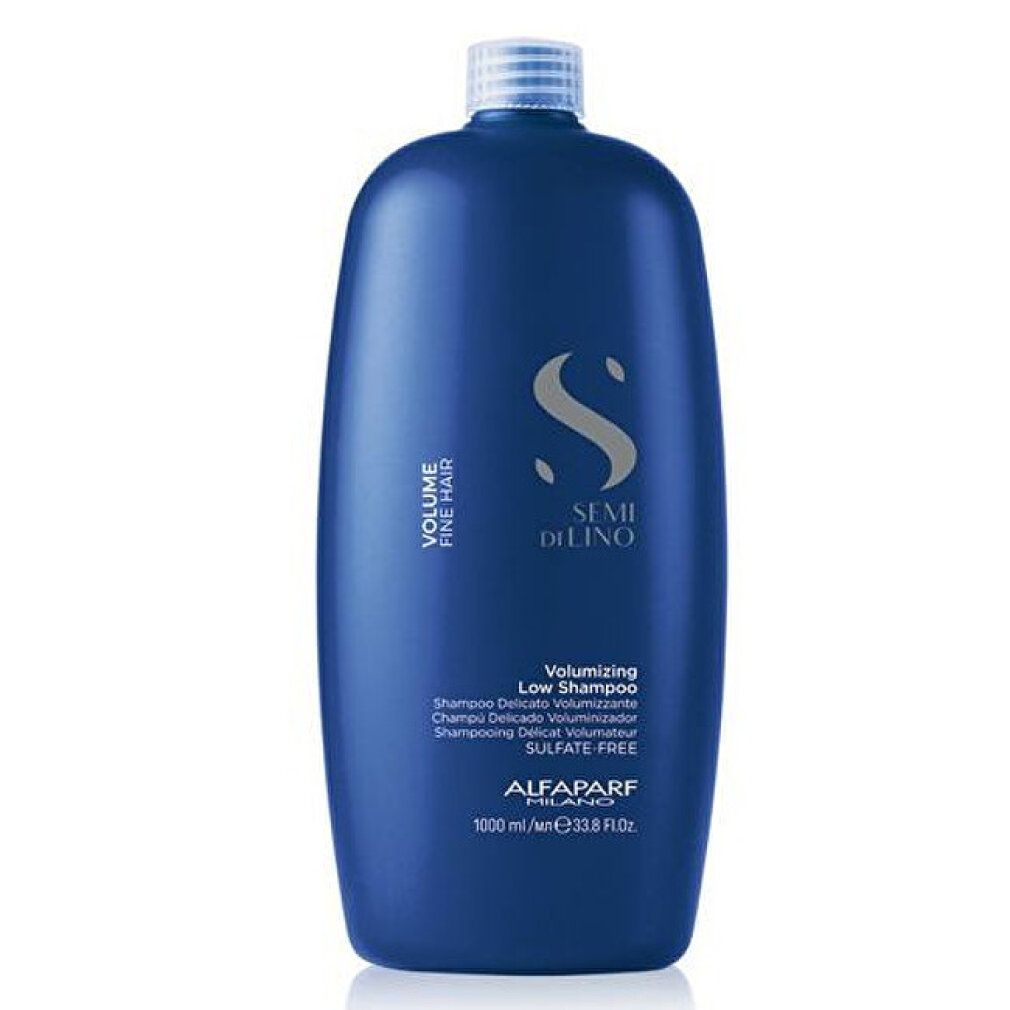 Flacone di shampoo blu. Testo: Volume Fine Hair, Semi Di Lino, Volumizing Low Shampoo, Alfaparf Milano. 1000 ml.