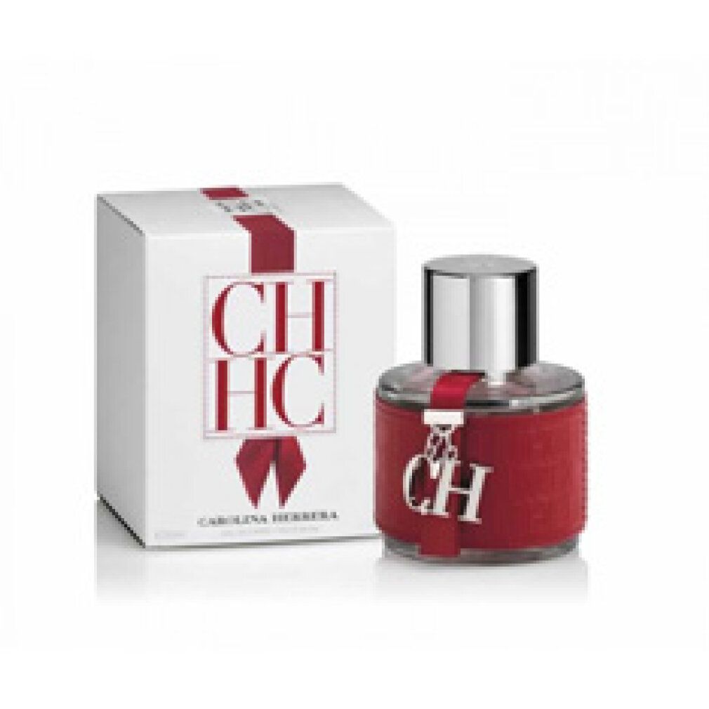 Flacone e confezione. Flacone: rosso, fascia in pelle, tappo argento. Confezione: bianca, scritte e fiocco rossi.