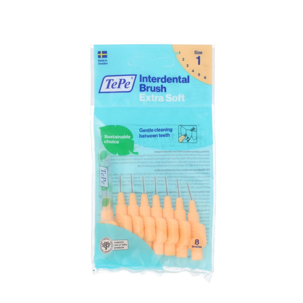 Confezione di 8 scovolini interdentali arancioni chiari TePe Extra Soft, taglia 1. Imballaggio trasparente. Setole e manici visibili.