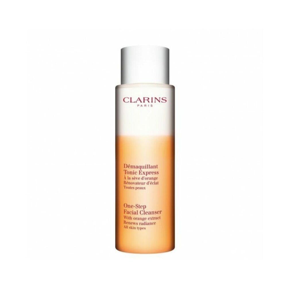Clarins One-Step Facial Cleanser. Bottiglia con liquido arancione e tappo bianco. Testo: Clarins Paris, Tonic Express, One-Step Facial Cleanser.