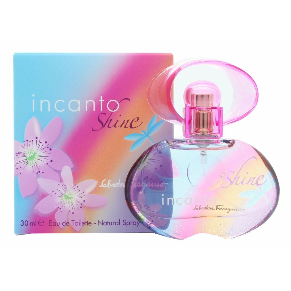 Flacone di profumo con confezione. Scritta: Incanto Shine, Salvatore Ferragamo. Flacone con motivo floreale e tappo rosa.