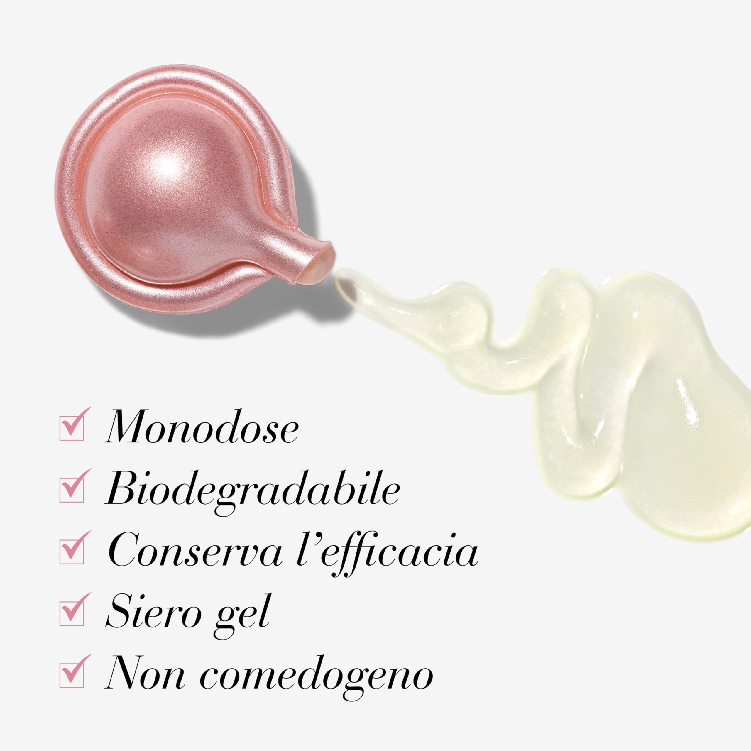Capsula rosa con siero che fuoriesce. Testo: Monodose, Biodegradabile, Conserva l'efficacia, Siero gel, Non comedogeno.