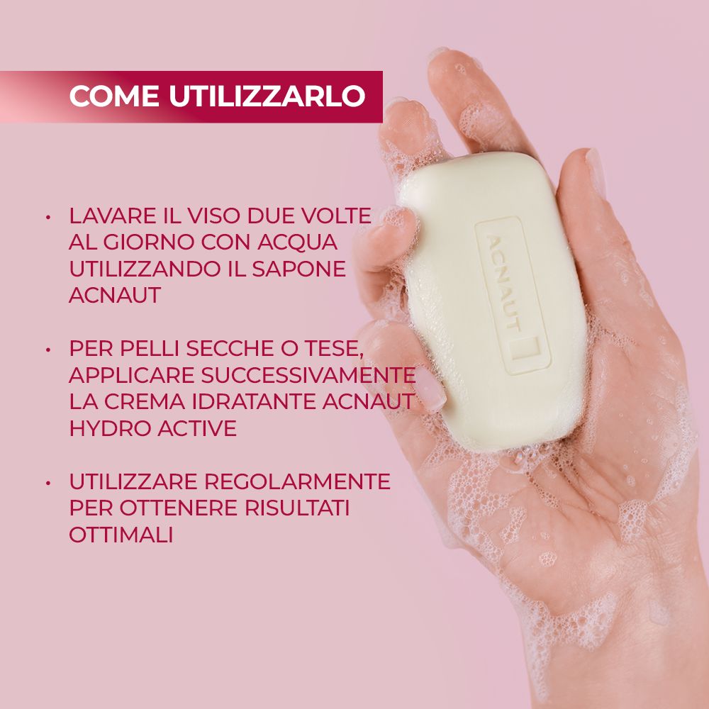 Mano che tiene il sapone. Testo: Uso: lavare il viso due volte al giorno. Per pelli secche, applicare crema.